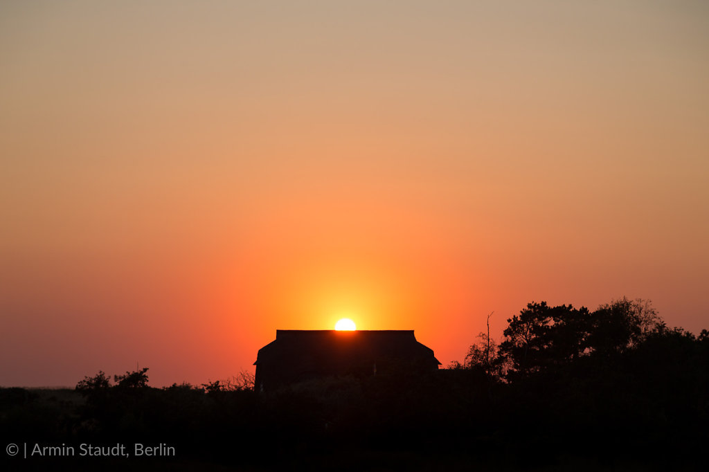 sunset behind a cottage at Hiddensee island
